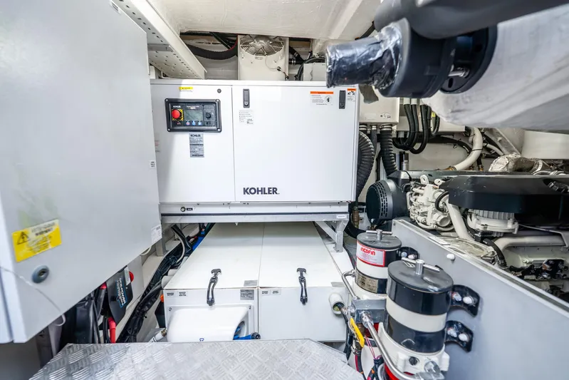 Azure Yacht Photos Pics Engine room of 2021 Azimut S6 yacht featuring Kohler generator and mechanical components.