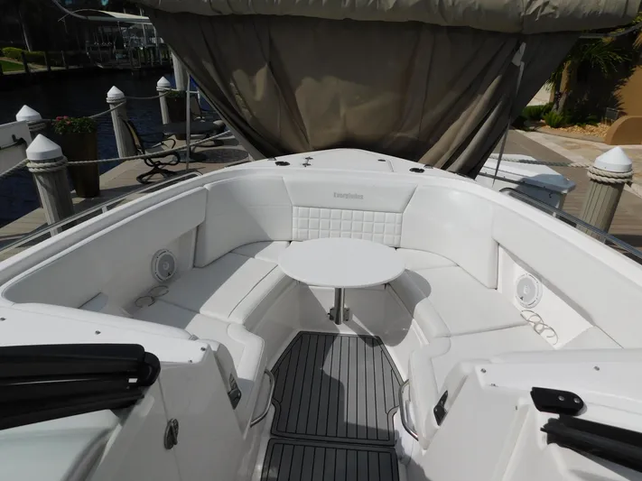 Out To Lunch Yacht Photos Pics 2019 Everglades 340 DC boat with white seating and round table in the bow.