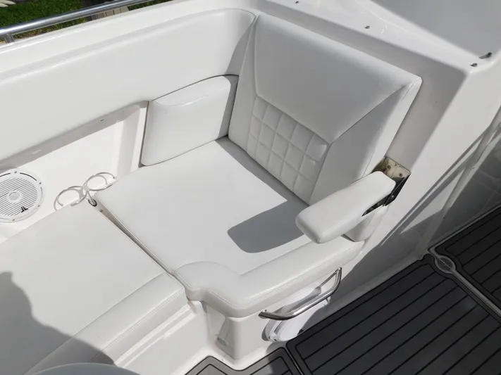 Out To Lunch Yacht Photos Pics 2019 Everglades 340 DC boat with white cushioned seating and armrest.