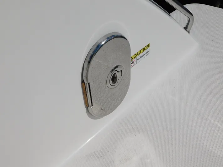 Out To Lunch Yacht Photos Pics 2019 Everglades 340 DC boat fuel cap with caution label.