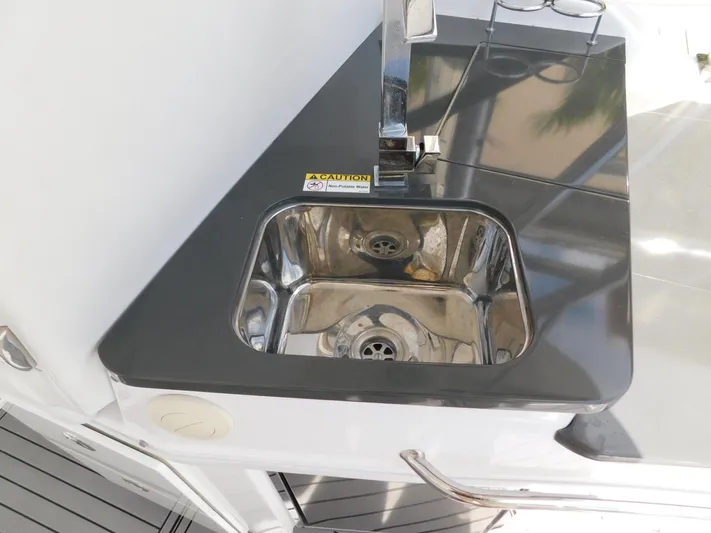 Out To Lunch Yacht Photos Pics Stainless steel sink on 2019 Everglades 340 DC boat.