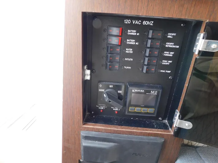 Out To Lunch Yacht Photos Pics Control panel of a 2019 Everglades 340 DC boat with various switches and gauges.