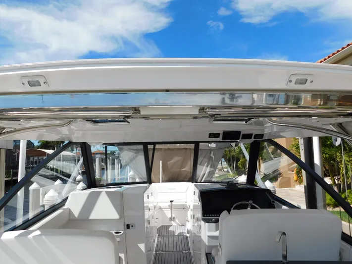 Out To Lunch Yacht Photos Pics Interior view of 2019 Everglades 340 DC boat with clear skies.