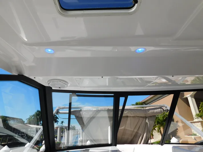 Out To Lunch Yacht Photos Pics Interior view of 2019 Everglades 340 DC boat with blue LED lights.