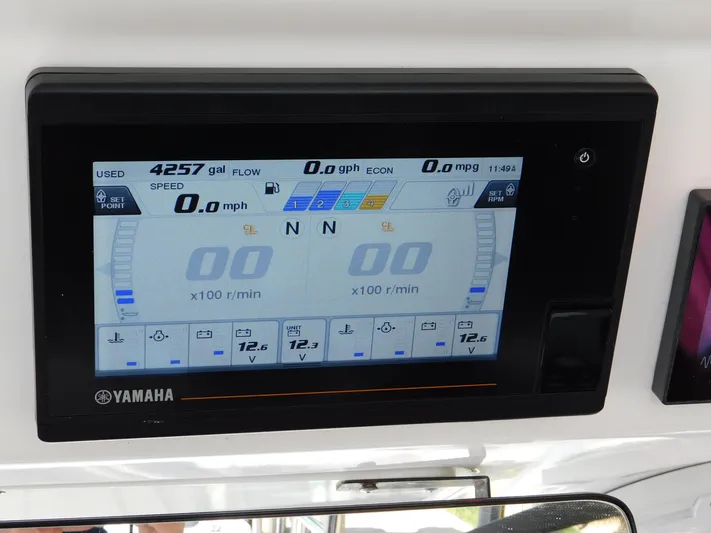 Out To Lunch Yacht Photos Pics Yamaha digital display on 2019 Everglades 340 DC boat showing speed, fuel, and engine data.