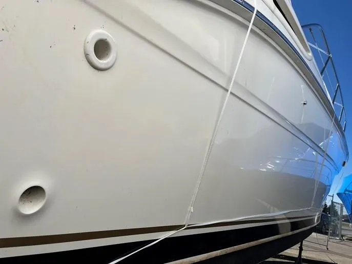  Yacht Photos Pics 2001 Sea Ray 380 Sundancer boat hull, white exterior with sleek design.