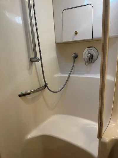  Yacht Photos Pics Shower area in 2001 Sea Ray 380 Sundancer yacht, featuring sleek design and modern fixtures.