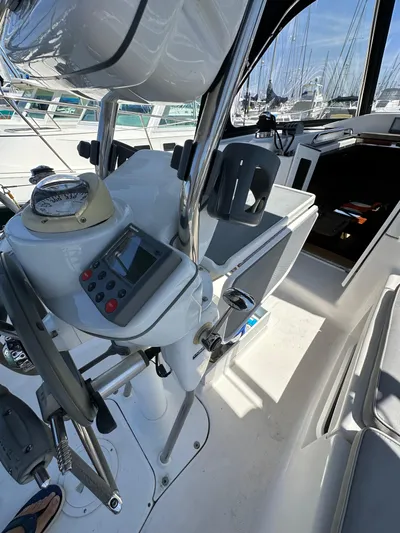 Wind Hunter Yacht Photos Pics Cockpit of 2013 Hunter 33 sailboat with navigation equipment and steering wheel.