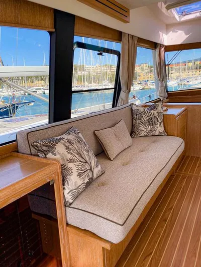  Yacht Photos Pics Luxurious interior of 2019 Sasga Yachts Menorquin 54 with marina view.