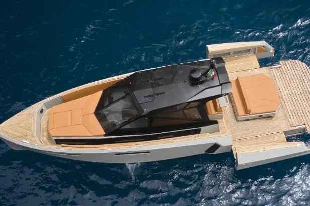 Yacht Photos Pics 2024 Evo Yachts R4+ luxury yacht on blue ocean water, top view.
