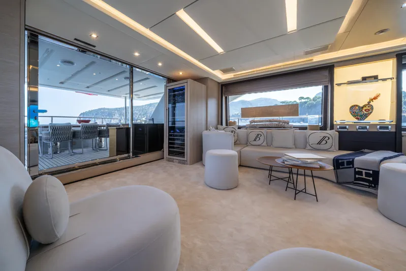Horizon Yacht Photos Pics Luxurious interior of 2016 Benetti 93' yacht with elegant seating and scenic views.