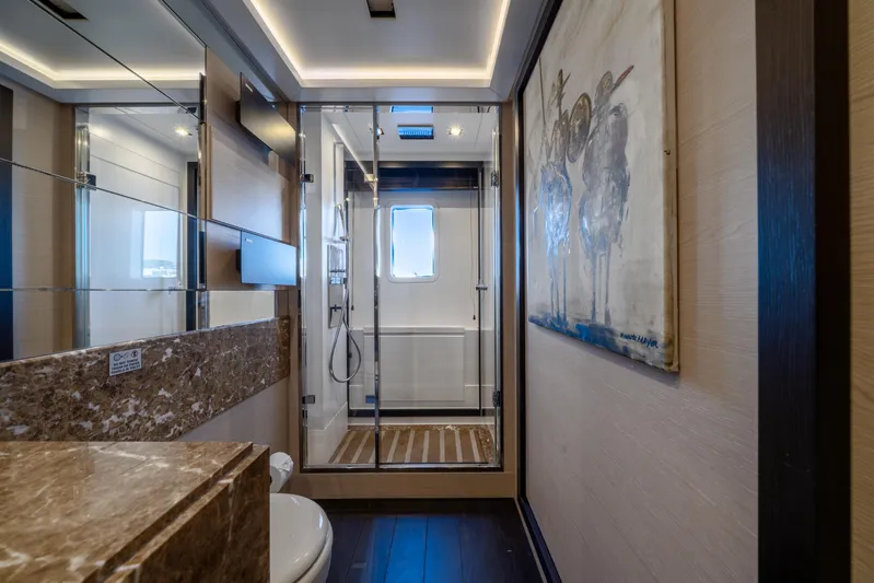 Horizon Yacht Photos Pics Luxurious bathroom on a 2016 Benetti 93' yacht with modern shower and elegant decor.