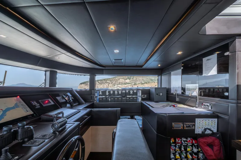 Horizon Yacht Photos Pics Luxurious interior of a 2016 Benetti 93' yacht cockpit with modern navigation equipment.