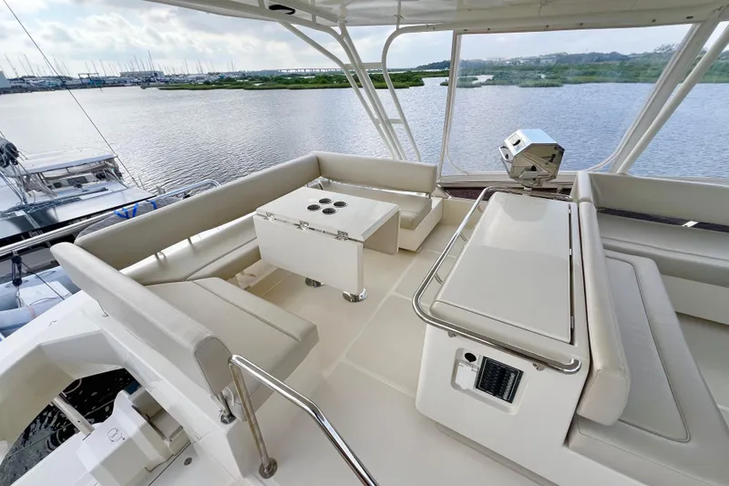 Tonga Time Yacht Photos Pics Luxurious 2019 Aquila 44 yacht interior with spacious seating and scenic water view.