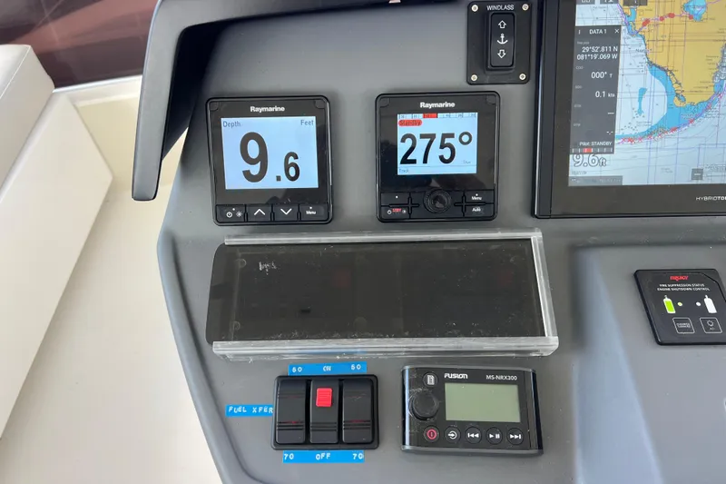 Tonga Time Yacht Photos Pics Aquila 44 yacht dashboard with navigation instruments and depth display, 2019 model.
