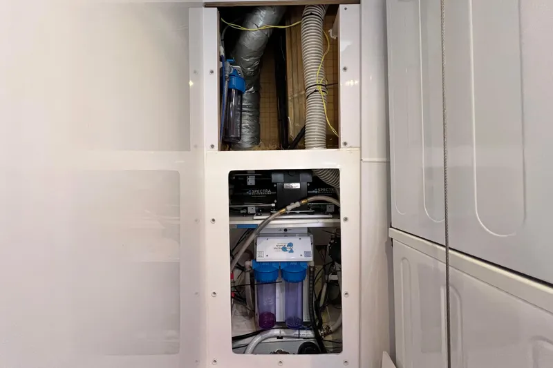 Tonga Time Yacht Photos Pics Interior view of Aquila 44 yacht's 2019 water filtration system.