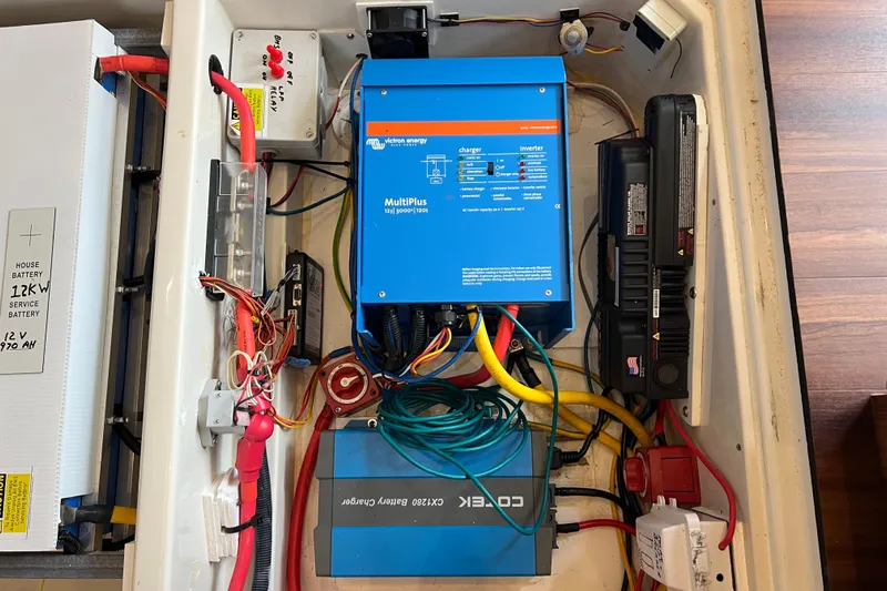 Tonga Time Yacht Photos Pics Electrical system setup in a 2019 Aquila 44, featuring Victron Energy MultiPlus inverter.