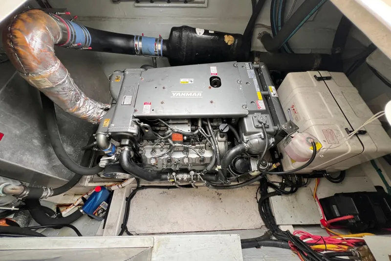Tonga Time Yacht Photos Pics Engine room of a 2019 Aquila 44 with Yanmar engine and exhaust system.