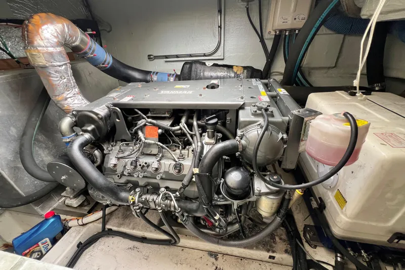 Tonga Time Yacht Photos Pics Engine room of a 2019 Aquila 44 yacht, featuring a Yanmar engine.