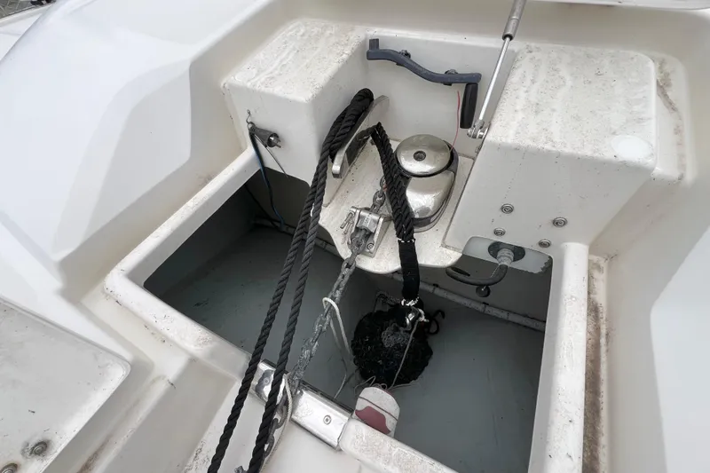 Tonga Time Yacht Photos Pics Anchor compartment of 2019 Aquila 44 boat with winch and ropes.