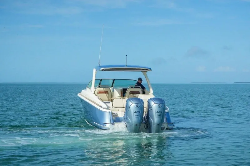  Yacht Photos Pics 2019 Chris-Craft Launch 35 GT OB cruising on open water with twin engines.