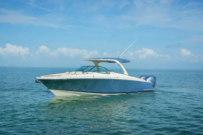  Yacht Photos Pics 2019 Chris-Craft Launch 35 GT OB boat on calm ocean waters under blue sky.