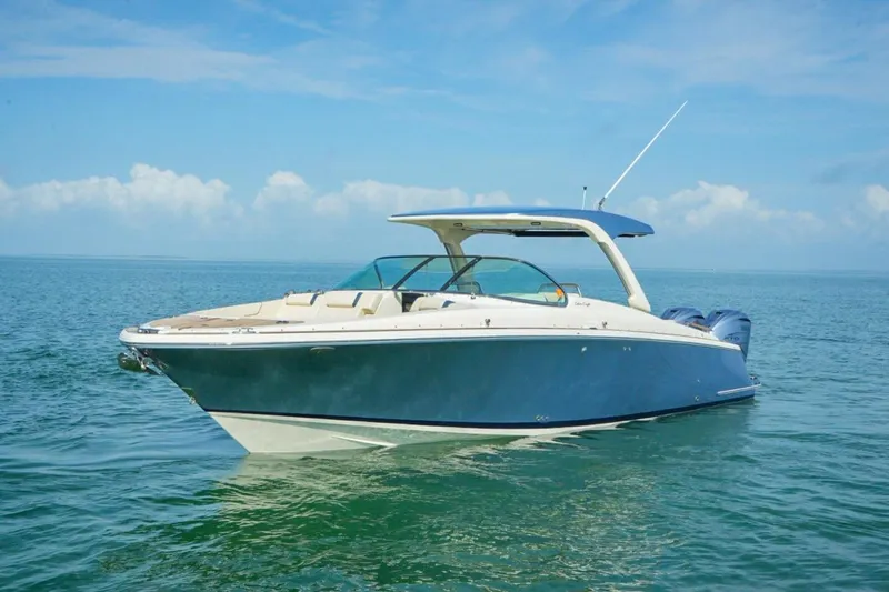  Yacht Photos Pics 2019 Chris-Craft Launch 35 GT OB boat on calm ocean waters.