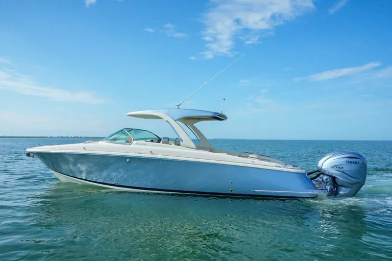 Yacht Photos Pics 2019 Chris-Craft Launch 35 GT OB boat on calm water, featuring Yamaha outboard engines.