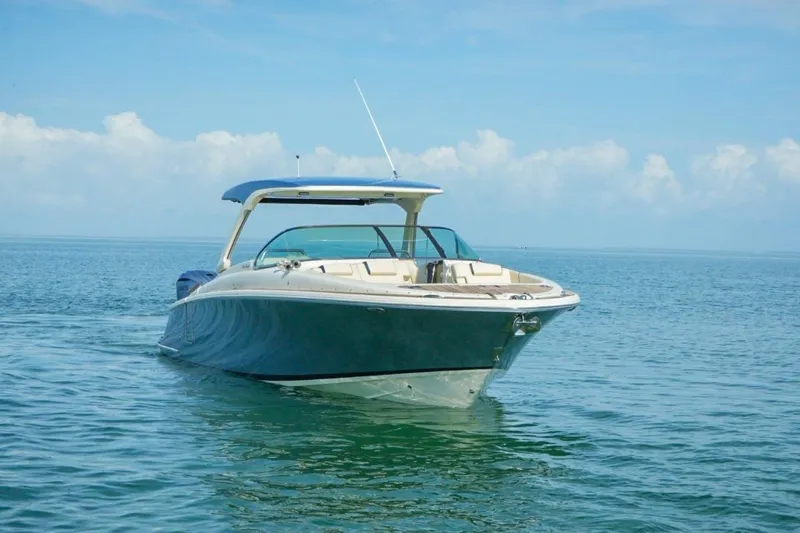  Yacht Photos Pics 2019 Chris-Craft Launch 35 GT OB boat on calm ocean waters.