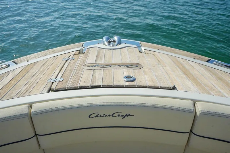  Yacht Photos Pics 2019 Chris-Craft Launch 35 GT OB boat deck with teak finish on water.