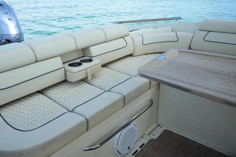  Yacht Photos Pics Luxurious seating area on 2019 Chris-Craft Launch 35 GT OB boat with cup holders.