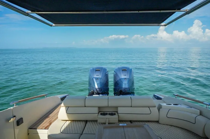  Yacht Photos Pics 2019 Chris-Craft Launch 35 GT OB boat with twin outboard engines on open sea.