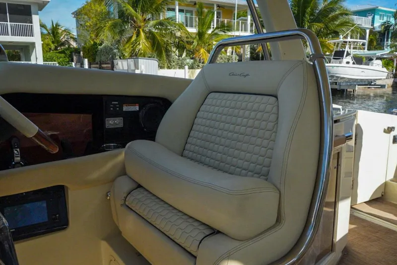 Yacht Photos Pics Luxurious 2019 Chris-Craft Launch 35 GT OB boat seat with elegant design and waterfront view.