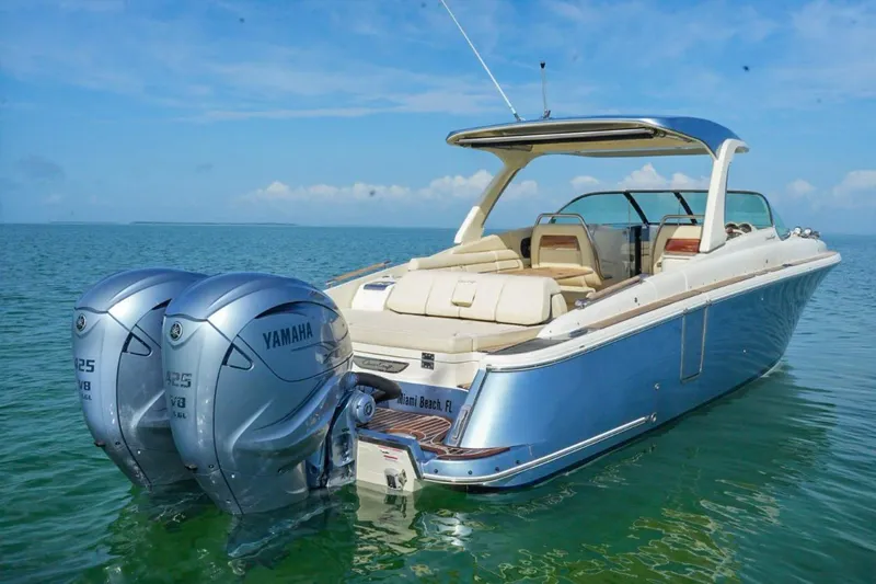  Yacht Photos Pics 2019 Chris-Craft Launch 35 GT OB boat with dual Yamaha engines on calm water.