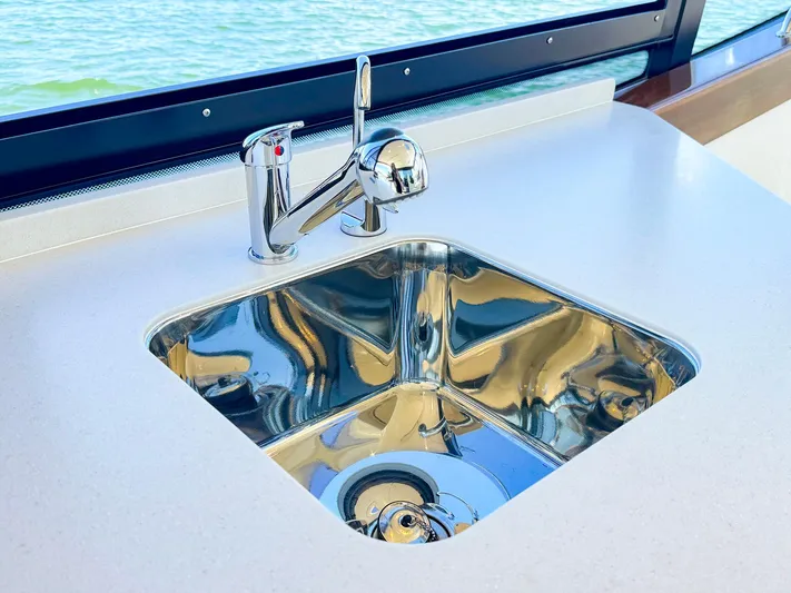 4794tw Yacht Photos Pics Stainless steel sink on 2024 MJM 4 yacht with ocean view.