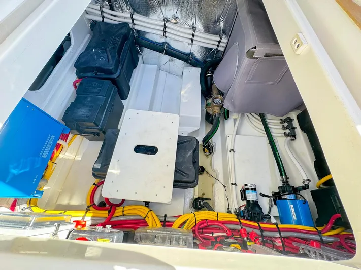 4794tw Yacht Photos Pics 2024 MJM 4 boat engine compartment with organized wiring and components.