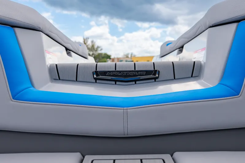  Yacht Photos Pics 2026 Nautique Super Air Nautique G23 boat interior with blue and gray seating.