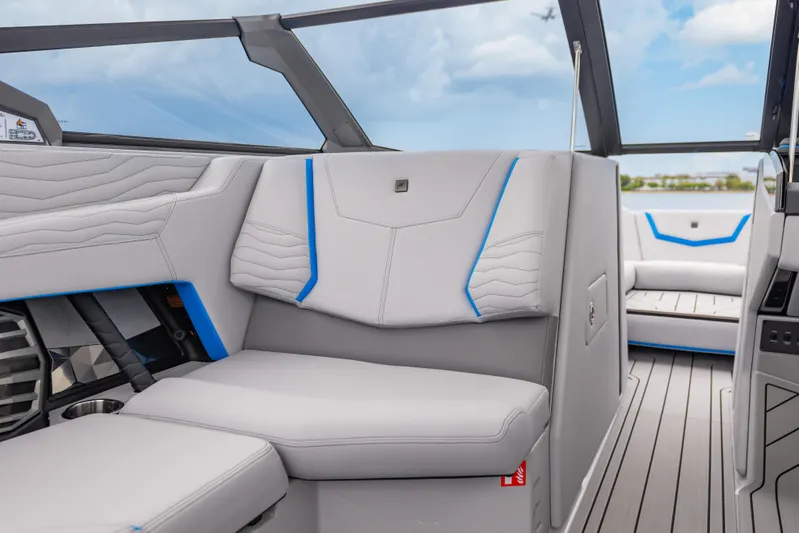  Yacht Photos Pics 2026 Nautique Super Air Nautique G23 interior with modern seating and sleek design.
