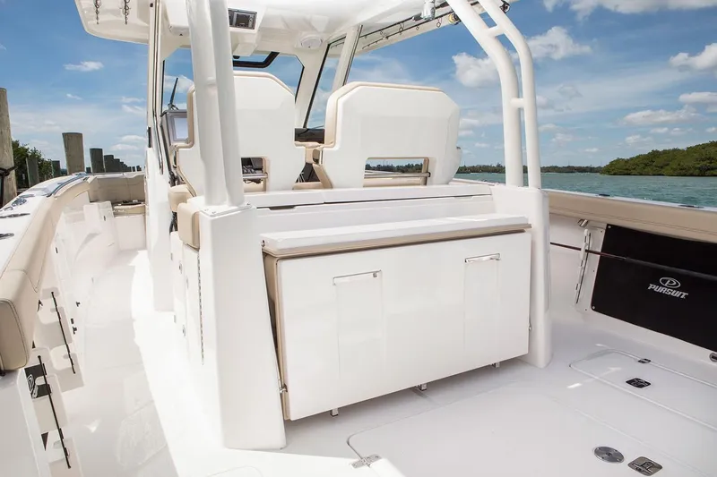 Amuninni Yacht Photos Pics Manufacturer Provided Image: 2021 Pursuit S 328 Sport boat interior with seating and storage.