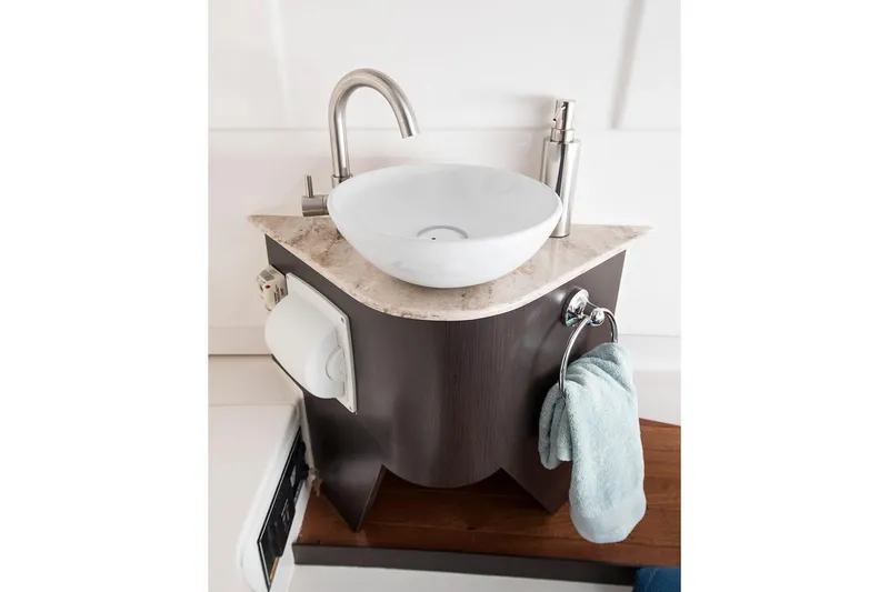  Yacht Photos Pics Manufacturer Provided Image: Modern bathroom sink in 2021 Pursuit S 328 Sport boat.