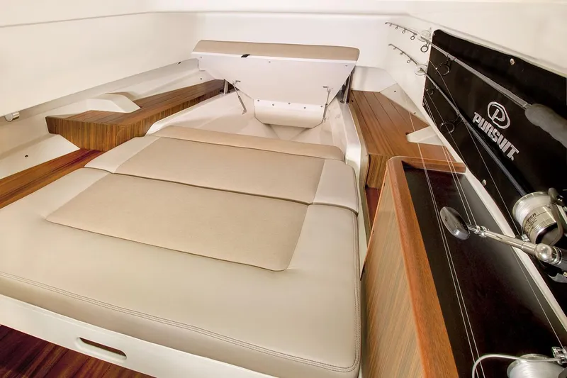 Yacht Photos Pics Manufacturer Provided Image: Interior cabin of a 2021 Pursuit S 328 Sport boat with cushioned seating.