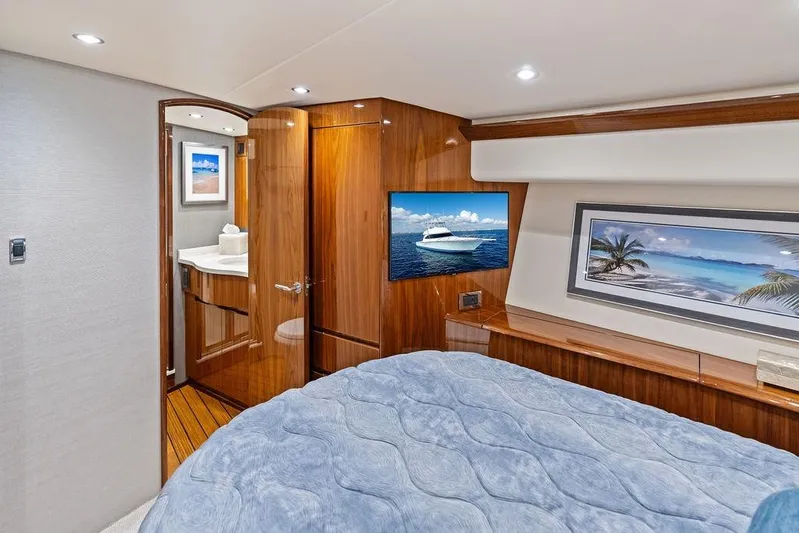 Lollipop Yacht Photos Pics Luxurious 2022 Viking 48 Convertible yacht interior with elegant wood finishes and modern amenities.