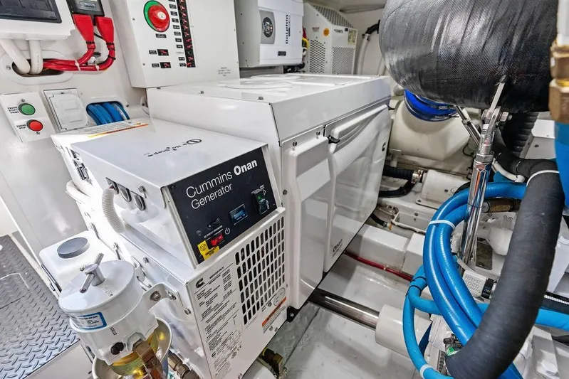 Lollipop Yacht Photos Pics Engine room of 2022 Viking 48 Convertible with Cummins Onan generator.