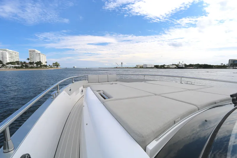 Momentum Yacht Photos Pics Azimut 47 VERVE 2023 yacht deck with ocean view and city skyline.