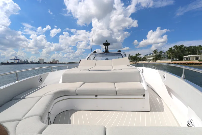 Momentum Yacht Photos Pics 2023 Azimut 47 VERVE yacht with spacious deck, luxurious seating, and scenic waterfront view.