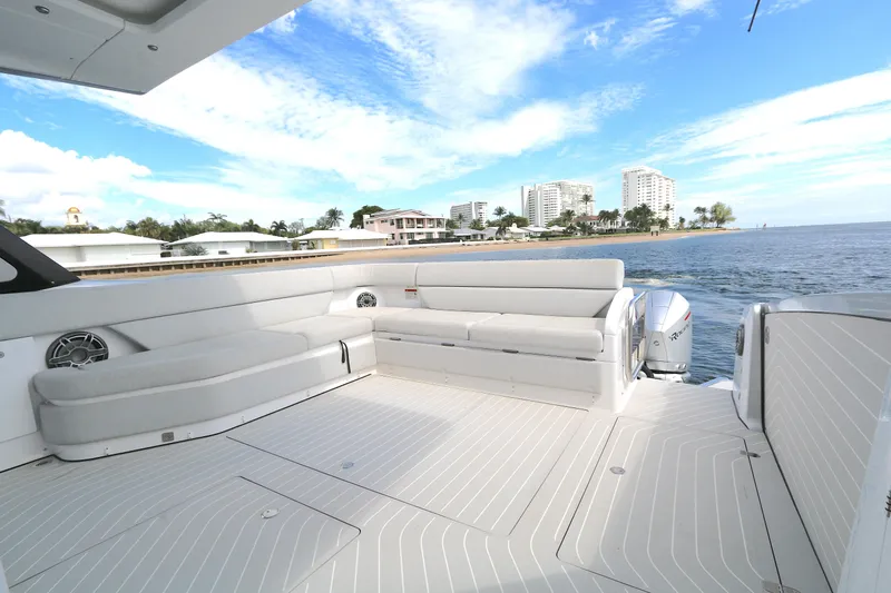 Momentum Yacht Photos Pics 2023 Azimut 47 VERVE yacht deck with luxurious seating, ocean view, and modern design.