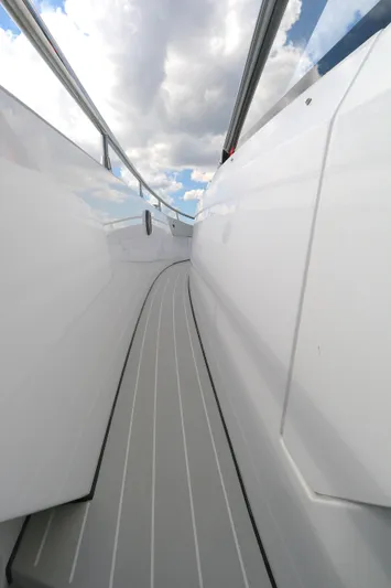 Momentum Yacht Photos Pics 2023 Azimut 47 VERVE yacht deck with sleek design and cloudy sky.