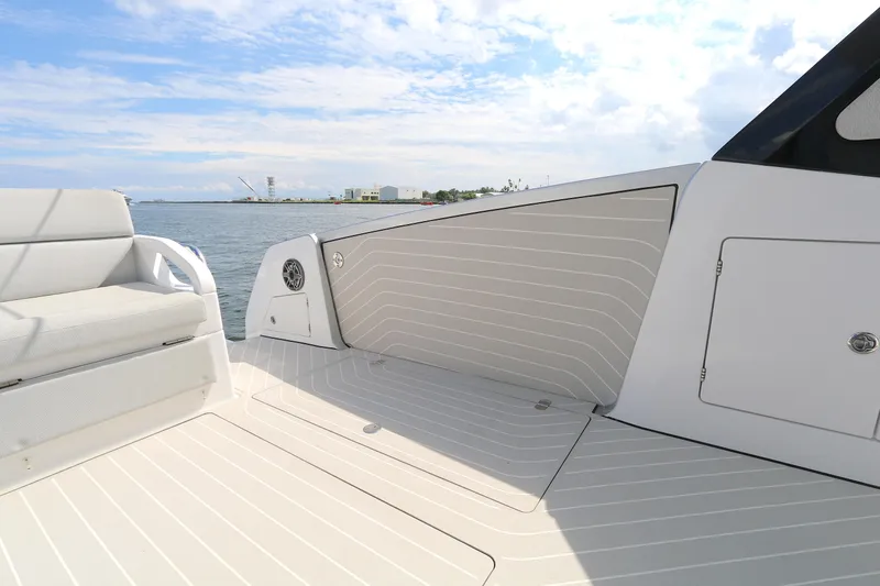 Momentum Yacht Photos Pics 2023 Azimut 47 VERVE yacht deck with sleek seating and ocean view.