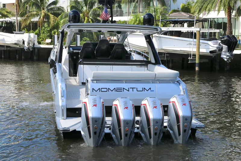 Momentum Yacht Photos Pics 2023 Azimut 47 VERVE luxury boat with four powerful outboard engines docked in a marina.