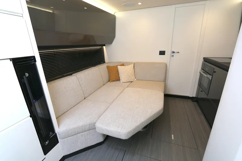 Momentum Yacht Photos Pics Modern interior of 2023 Azimut 47 VERVE yacht with sleek sofa and minimalist design.
